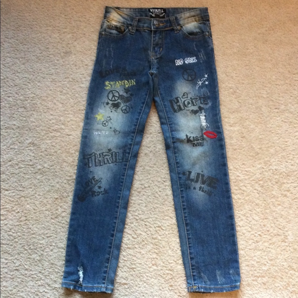 Girls Thrill distressed jeans.